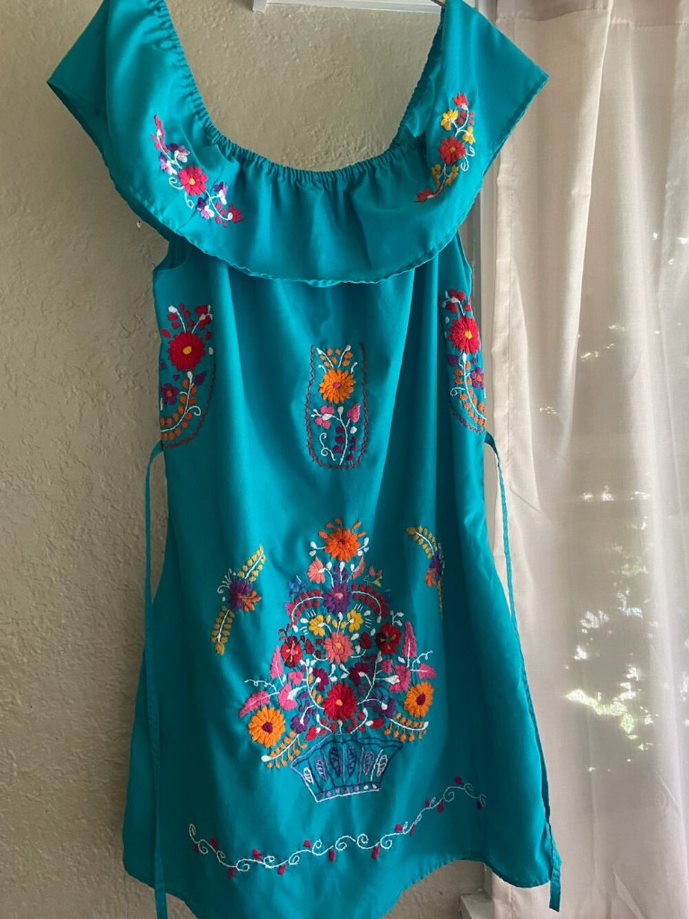 Mexican style embroidered turquoise blouse